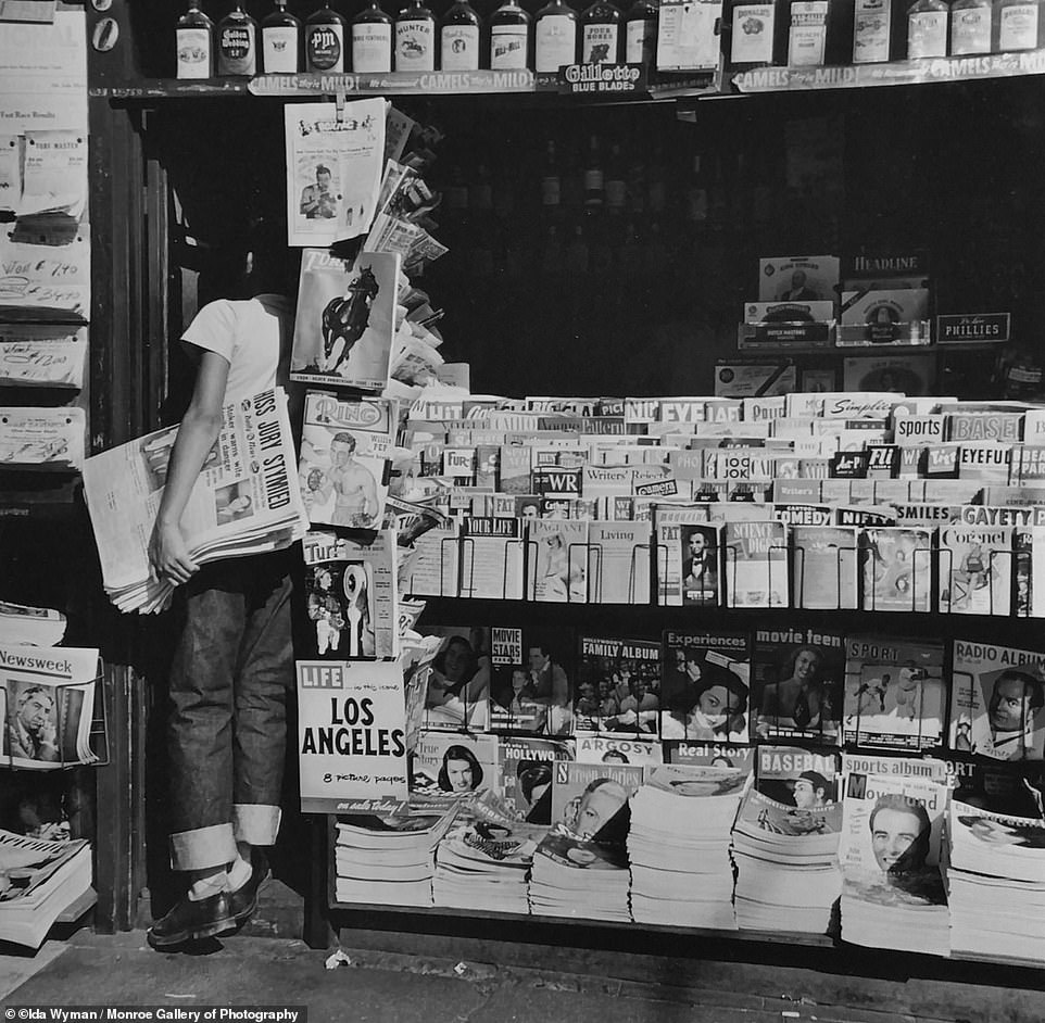 A young boy works a newsstand in Los Angeles, 1950. Ida Wyman's most memorable work stems from the six years between 1945 - 1951. By then she had married Simon Nathan, a fellow photographer at Acme and decided to become a homemaker when their first child, David was born that same year.
