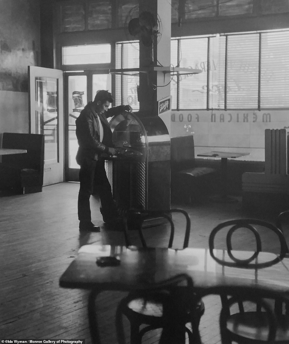 A man selects a song on the jukebox at the Vera Cruz Café in Los Angeles. 1950. In Wyman's 2014 memoir titled Chords of Memory, she said: 'Wearing the camera trumped my shyness, it enabled me to talk to complete strangers and hear their stories. … I wasn't threatening and I wore saddle shoes with bobby socks'.