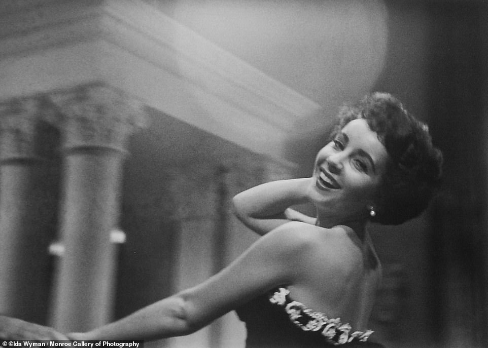 Elizabeth Taylor in 1950 on the set of 'A Place in the Sun' is caught mid-dance with Montgomery Clift (only his hand is visible). Ida Wyman was a photojournalist born in 1926 to Latvian immigrants that owned a small grocery store in the Bronx. She amassed a colossal photo archive throughout her career while working for Life, Look and other magazines during the 1940s and '50s; but her work was never properly recognized and she went unheralded for her entire life.