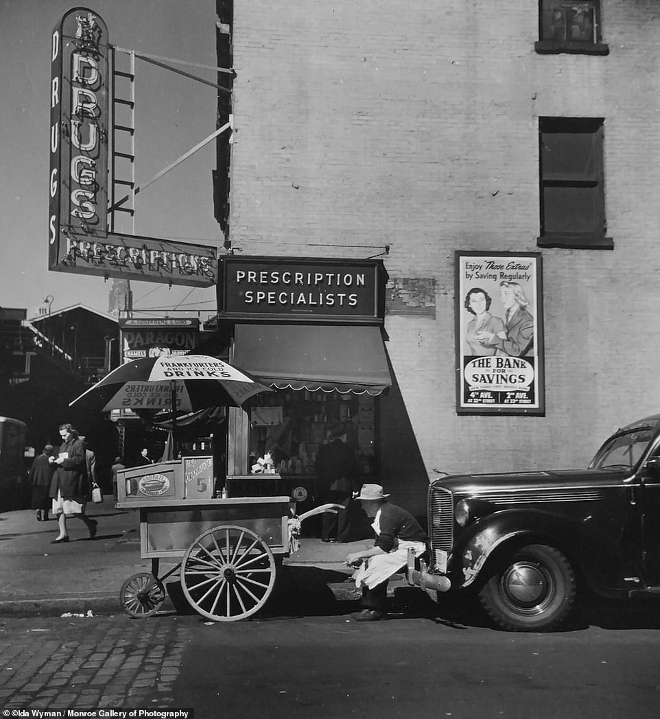Frankfurters and Ice Cold Drinks Hot Dog Cart and Vendor in New York, 1948. Wyman wrote in her 2014 memoir that she liked photographing 'the expressions on faces and the hustle and bustle created by crowds intent on their destination'.