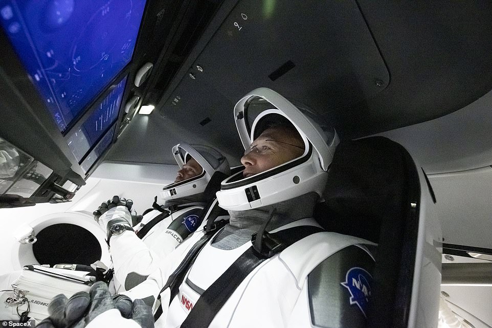 NASA astronauts Robert Behnken and Douglas Hurley were strapped in the cabin of Crew Dragon Capsule ready for blast off when the disappointing announcement was made