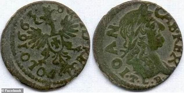 The coins are part of a pre-Christian belief and were placed in the mouth of the dead to be used as payment for the ferryman to bring the soul across the river that divided the world of the living and the dead