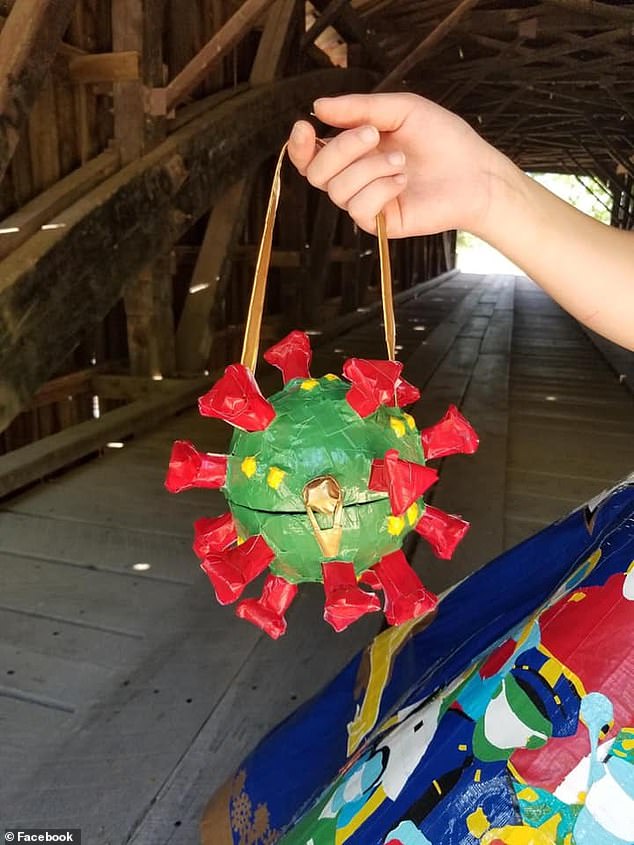 Too cute! The coronavirus-shaped purse is her favorite element of the ensemble