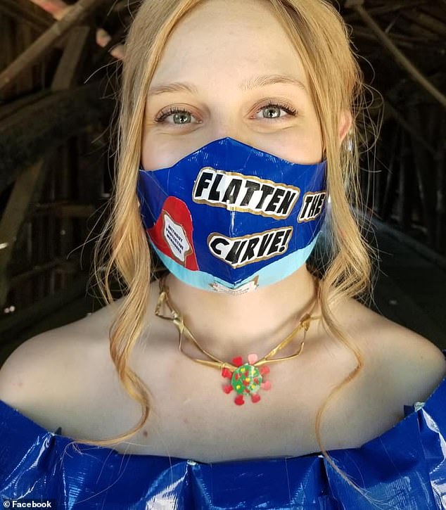 Must-have: Of course, she added a face mask that says 'flatten the curve' (though likely only wore it for this picture because a duct tape mask wouldn't be breathable0