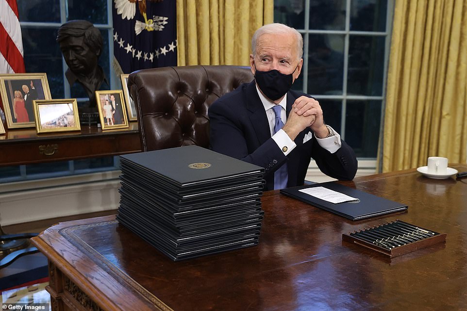 Pride of place: A bust of socialist Cesar Chavez now sits behind Biden after he removed a bust of Winston Churchill