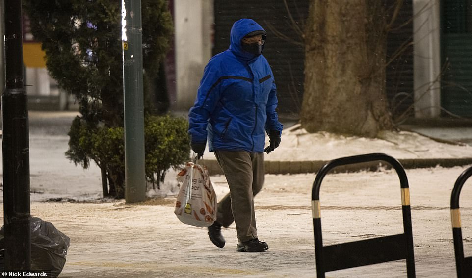 Locals in Bermondsey today headed out for some early morning shopping after hundreds of schools shut for a snow day in the East yesterday
