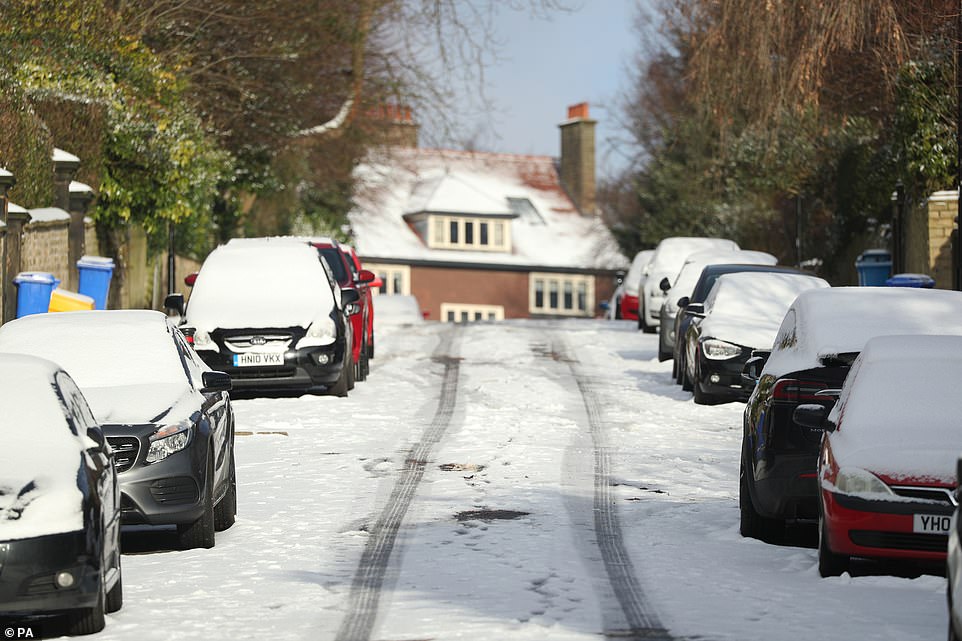 A snow-covered street in Sheffield, as bitterly cold winds continue to grip much of the nation