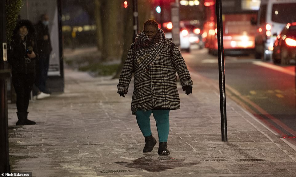 While London, pictured Bermondsey this morning, has been able to operate as normal, snow in the East caused 10 Covid-19 vaccination centres to close yesterday