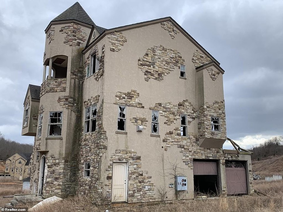 The castle-like structures were supposed to become high-end vacation homes, nestled amongst a huge resort with a gold course, marina and indoor water park