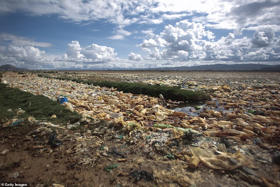 The lake, and Tagarete river flowing from the nearby city of Oruru, are covered in mountains of rubbish as far as the eye can see