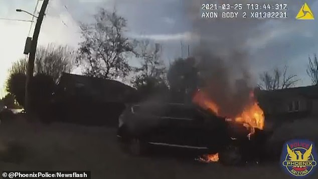 Bodycam footage shared by the Phoenix Police Department showed two cops running towards a burning vehicle, inside of which, the driver sat unconscious