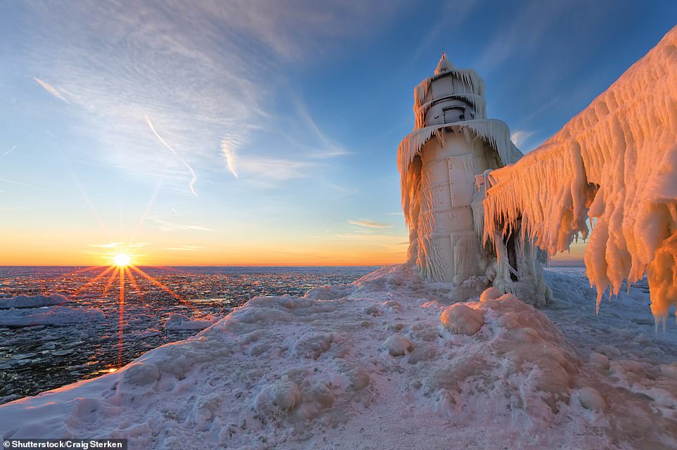 ST JOSEPH NORTH PIER LIGHTHOUSE, LAKE MICHIGAN, USA: Ford explains: 'Spray from the waves is whipped on to the subfreezing structure, where it freezes almost instantly'