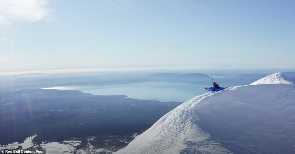After soaking up the scenery, Serrasolses gets into his kayak to make the 15.5-mile (25-kilometre) descent down the volcano