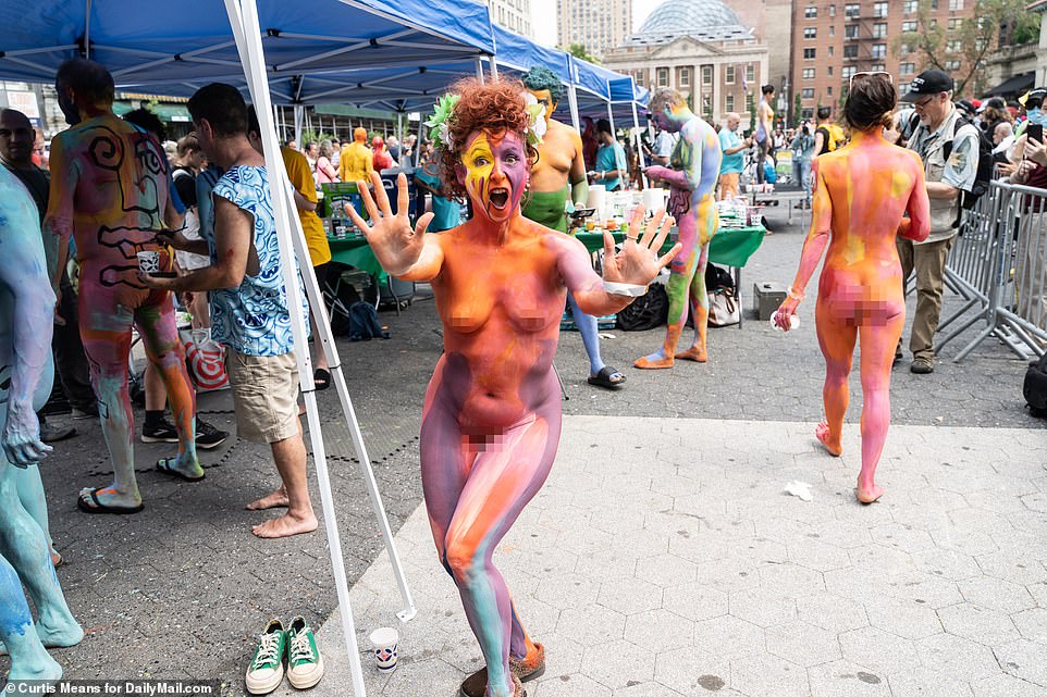 One woman appeared to have stepped out of a cartoon as she gestured towards the camera on Sunday afternoon in New York