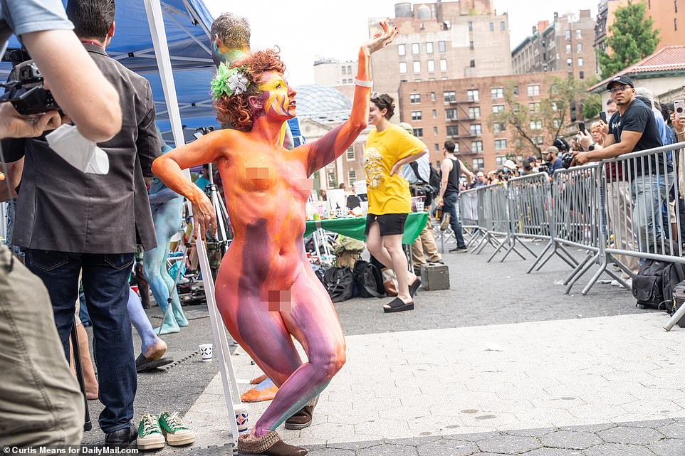Participants struck a pose once the artwork was done to allow budding photographers to take a snap
