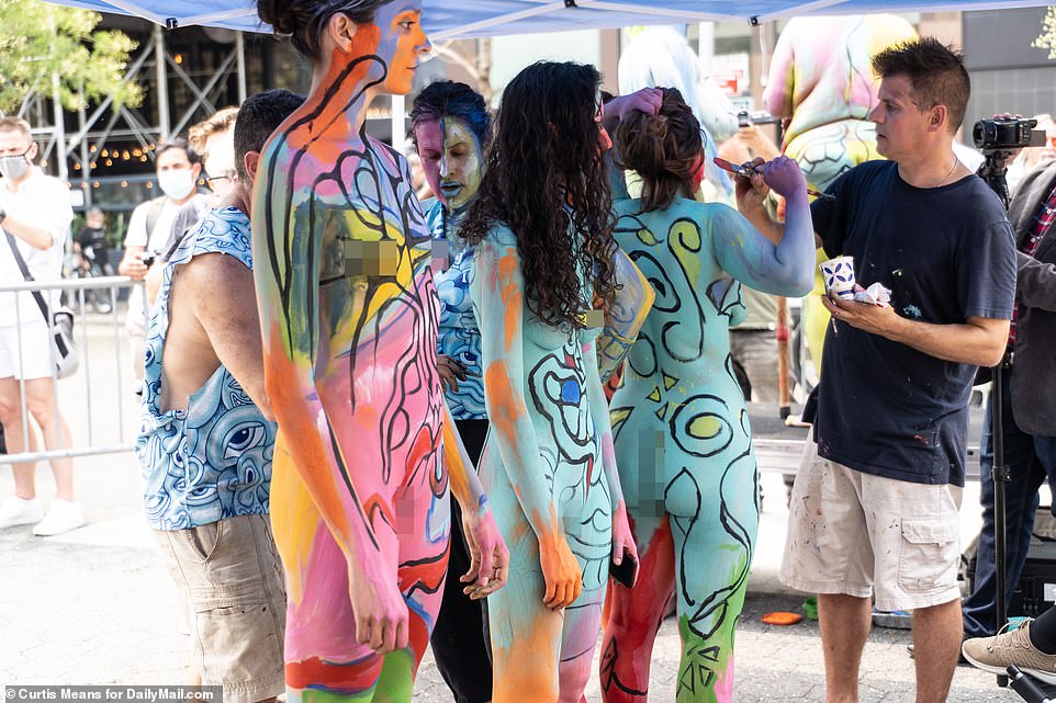 Models of all shapes and sizes marched from Union Square to Greenwich Village before boarding a double-decker bus to travel through the city, over the Manhattan Bridge getting off in Greenpoint, Brooklyn
