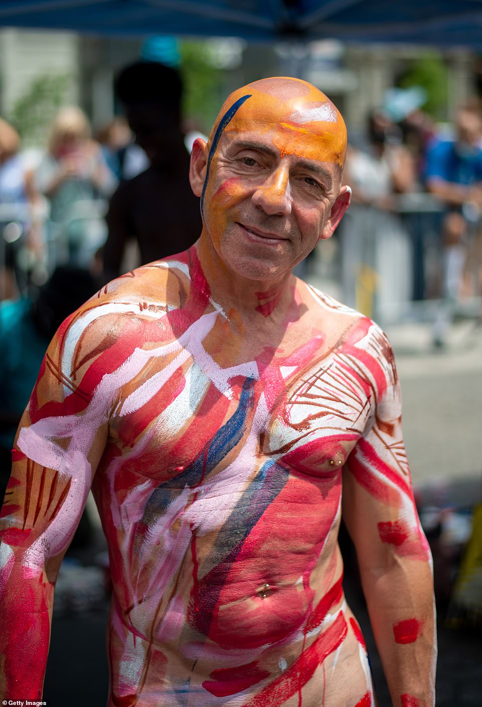 People participate in the 8th annual Body Painting Day' in Union Square in New York City.