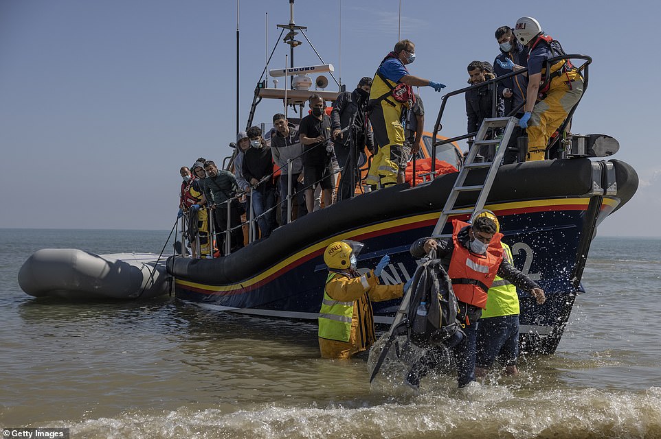 More than 260 people are thought to have arrived aboard a dozen boats on Tuesday (pictured at Dungeness)