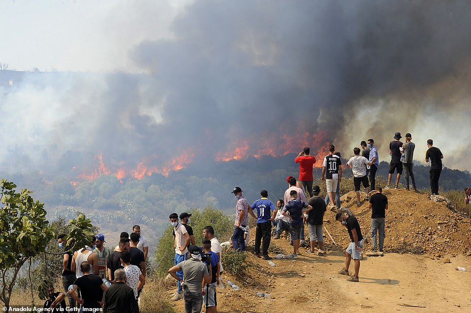 Smokes rise from the wildfire at Beni Douala town in Tizi Ouzou Province in northern Algeria