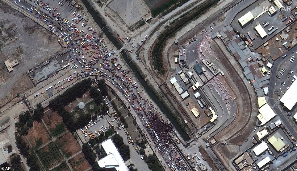 Diplomats insist that the situation on the ground has improved since the weekend with more people being allowed into the airport, but satellite images showed huge crowds continuing to mass