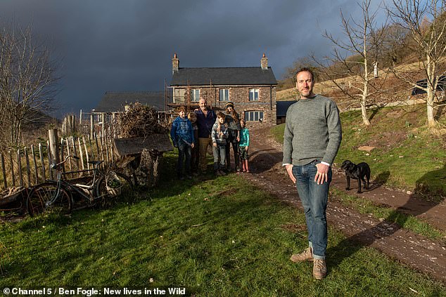 The presenter was deeply impressed with the house, pictured, that the Powell had built using wood they cut from local trees and other local materials
