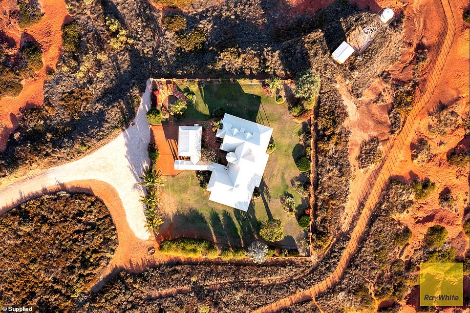 The sprawling homestead was rebuilt 25 years ago after a fire razed the house originally constructed there in 1970