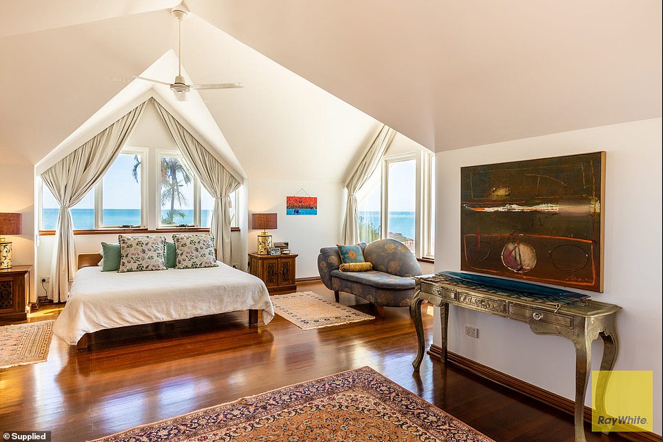 There are five bedrooms (one pictured) that boast sweeping views of the ocean