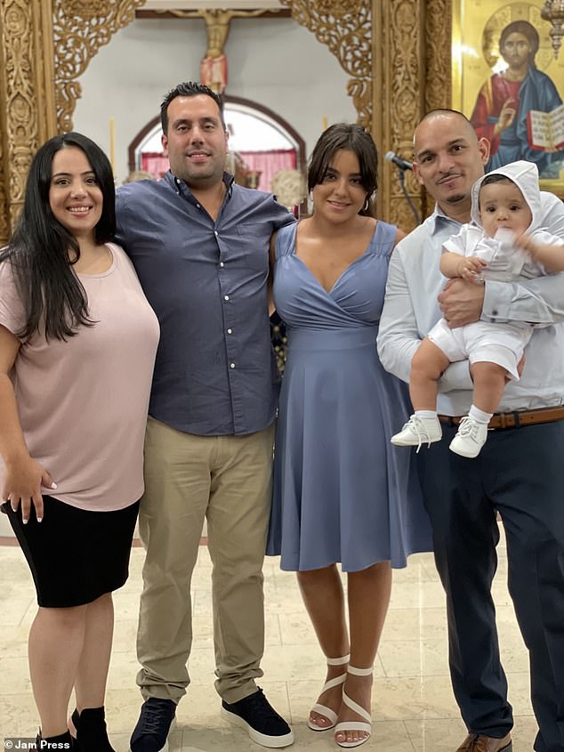 A family affair: Marina (godparent), Demitri (father), Melina (mum) and Ed (godparent) during the baptism