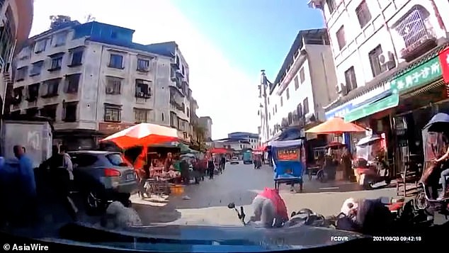 As the car eventually comes to a stop, three victims are seen lifting their heads or getting to their feet in front of the driver’s dash-cam