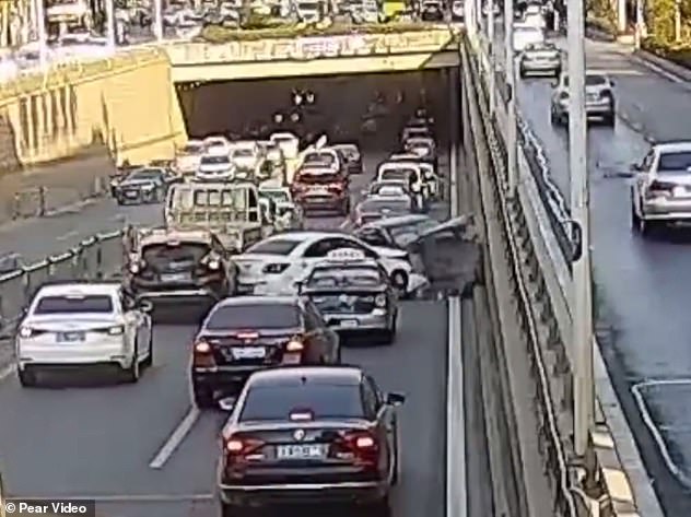 The female driver later told authorities that she was feeling drowsy after taking flu medication, resulting in her losing control of the car, according to local traffic police