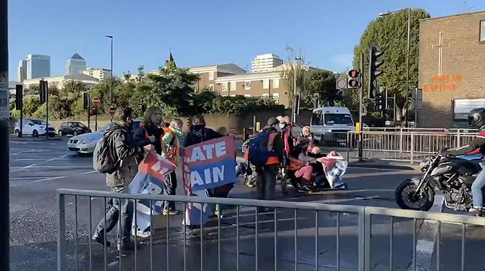 Fifty demonstrators from XR splinter group Insulate Britain clashed with motorists as they blocked major roads during rush hour