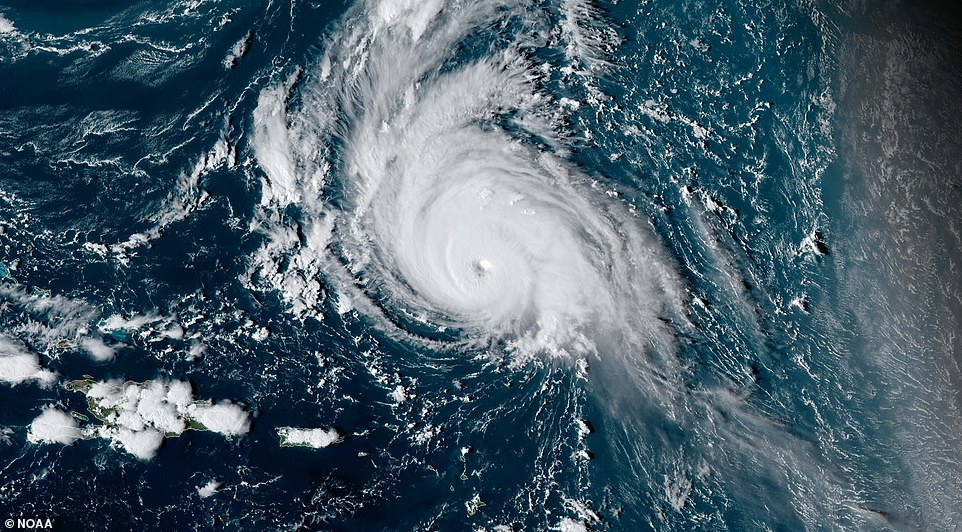 Experts say Hurricane Sam (pictured) is currently moving across the Atlantic and will drive high pressure across Britain