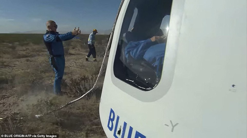 Blue Origin boss: Bezos welcomed home four new astronauts on Wednesday morning, giving them a thumbs up