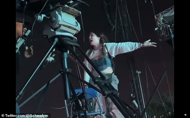 Shocking video shows a woman imploring a cameraman to stop the show, telling him 'There is somebody dead in there' The crew member dismisses his concerns as he continues filming