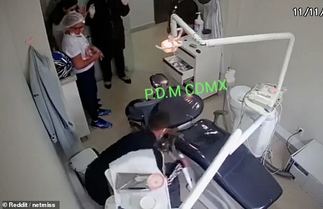 The thug trying to search the officer shortly before he is overpowered