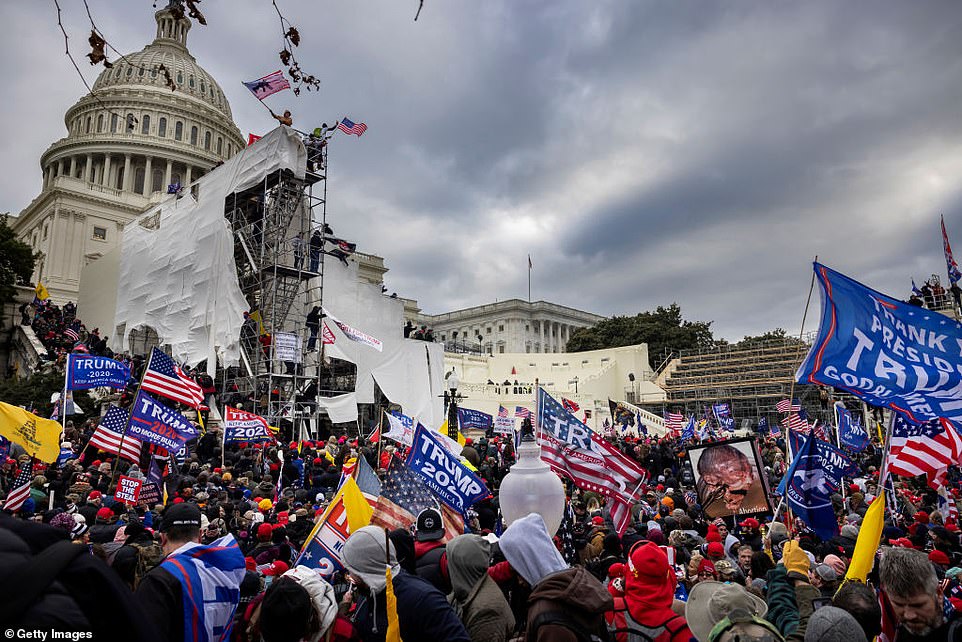 Trump supporters clash with police and security forces as people try to storm the US Capitol on January 6