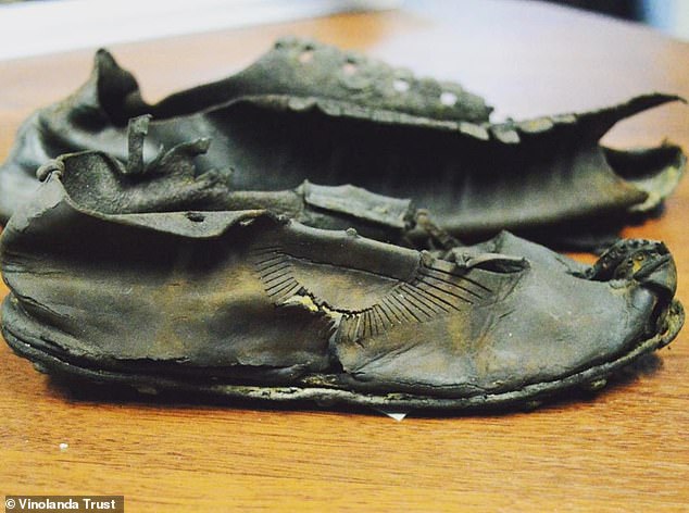 Pictured is another example of the Roman shoes found at Vindolanda, alongside Hadrian's Wall