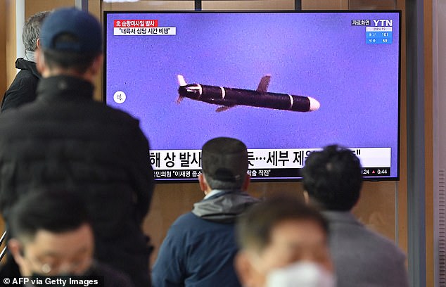 Tuesday's launch follows tests of a tactical guided missile capable of high speed and maneuvering after lift-off, and a railway-borne missile system. Pictured: People watch a news broadcast showing North Korean missile test, at a railway station in Seoul on January 25, 2022