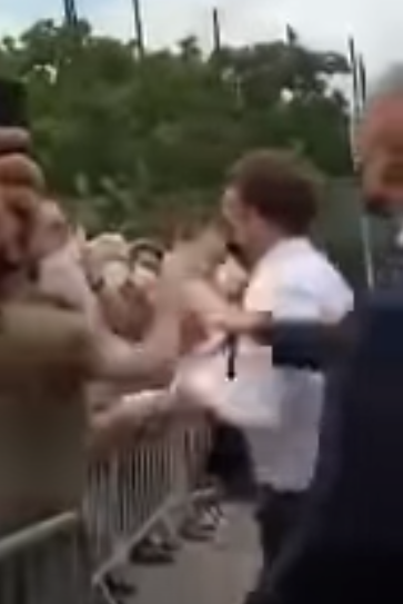 The French leader was quickly pulled away after he was slapped