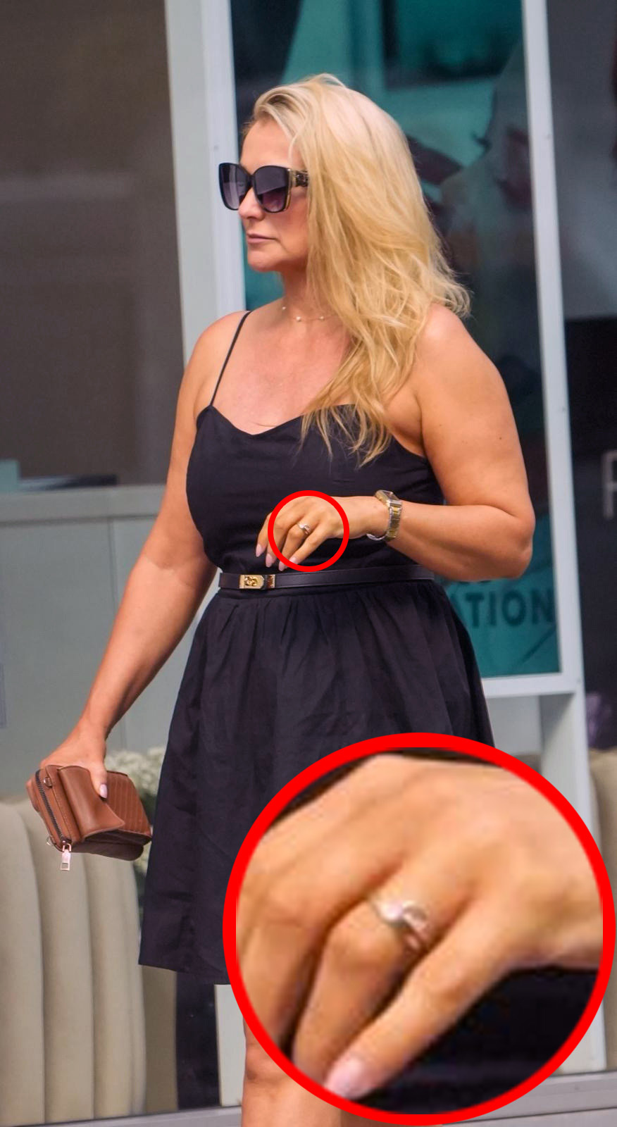 The Sun's photos shows Katie flashing the sparkler in London