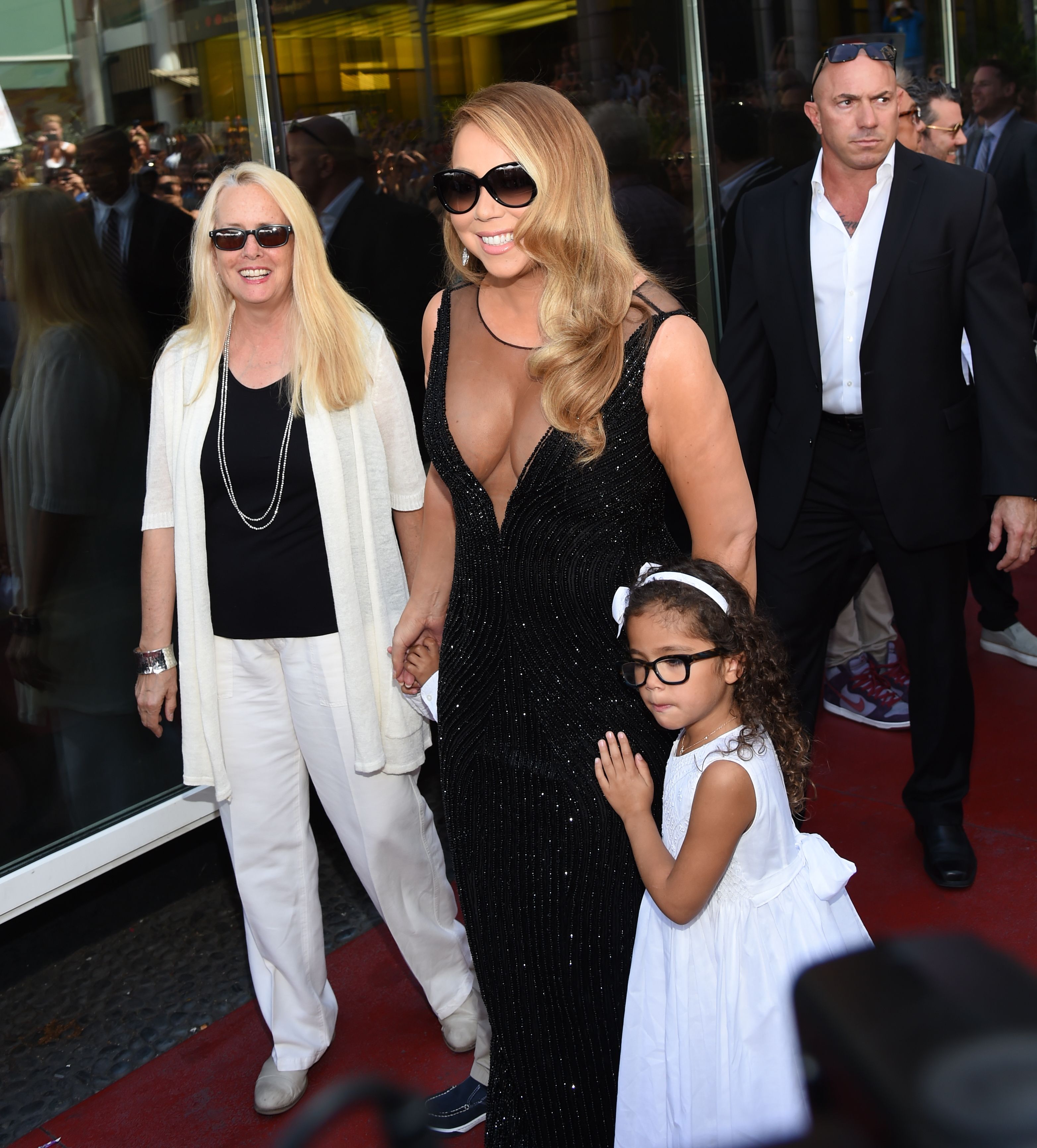 Singer Mariah Carey, mom Patricia, and daughter Monroe Cannon at a past event